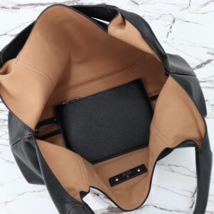 Softbit Maxi Shoulder Bag. Authentic quality luxury bag crafted in genuine leather comes with authenticity card, dust bag and gift bag. Icon Reimagined: Effortless Luxury with a Modern Bit of Bold. *ucci’s timeless heritage meets contemporary ease in the new Softbit Shoulder Bag. Crafted from supple grained leather with a luxuriously rich texture, this piece balances sophistication and function effortlessly. At its heart lies an oversized half-horsebit — a bold reinterpretation of the House’s iconic detail — accenting the magnetic closure with statement appeal. With its relaxed silhouette and refined craftsmanship, the Softbit is the perfect companion for those who favor effortless elegance with a modern edge.