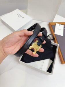 Border Triomphe Belt. Authentic quality luxury bag crafted in genuine leather comes with authenticity card, dust bag and gift bag. Where Parisian Precision Meets Effortless Elegance. The Border Triomphe Belt embodies Parisian refinement in its purest form. Crafted from luxurious smooth calfskin, this elegant accessory is framed by subtle contrasting borders that highlight its sleek lines and meticulous craftsmanship. At its center, the iconic Triomphe buckle—an emblem of *ELINE’s timeless heritage—adds a touch of golden sophistication. Whether paired with tailored trousers, a flowing dress, or high-waisted denim, this belt transforms any outfit into a statement of effortless elegance. A true symbol of quiet luxury, the Border Triomphe Belt is the ultimate finishing touch for those who appreciate understated glamour and modern French allure.