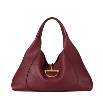 Softbit Maxi Shoulder Bag. Authentic quality luxury bag crafted in genuine leather comes with authenticity card, dust bag and gift bag. Icon Reimagined: Effortless Luxury with a Modern Bit of Bold. *ucci’s timeless heritage meets contemporary ease in the new Softbit Shoulder Bag. Crafted from supple grained leather with a luxuriously rich texture, this piece balances sophistication and function effortlessly. At its heart lies an oversized half-horsebit — a bold reinterpretation of the House’s iconic detail — accenting the magnetic closure with statement appeal. With its relaxed silhouette and refined craftsmanship, the Softbit is the perfect companion for those who favor effortless elegance with a modern edge.