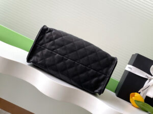 25 Small Handbag.  Authentic quality luxury bag crafted in genuine leather comes with authenticity card, dust bag and gift bag. Sleek, Sculptural, and Bold. A striking fusion of elegance and modernity, the *ANEL 25 Small is crafted in calfskin that catches the light with every curve. This piece from the Fall-Winter 2025/26 collection blends soft texture with architectural precision. Refined yet edgy, it features a gold-tone chain strap and double-C clasps, delivering the signature *ANEL aesthetic in a fresh, contemporary way. With a roomy interior, the 25 Small balances wearability and luxury — perfect for day-to-evening sophistication. Explore the essence of *ANEL in a design that celebrates texture, volume, and heritage.