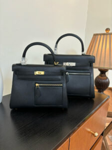 Kelly Colormatic. Authentic quality luxury bag crafted in genuine leather comes with authenticity card, dust bag and gift bag. Hand-crafted from ultra-smooth Swift leather and finished with radiant gold hardware, this exceptional limited-edition masterpiece brings a fresh, artistic twist to the iconic Kelly silhouette. Its cleverly designed front pocket opens wide with a single gusset for effortless access, while the rear flap pocket keeps your daily essentials—especially your most-used cards—right at your fingertips. The asymmetric yet perfectly balanced colour combination highlights the haute craftsmanship Hermès is celebrated for, turning every stitch into a statement. A collector’s dream and a style enthusiast’s delight, the Kelly Colormatic is sophistication with a spark—functional, vibrant, and unmistakably *rmès.