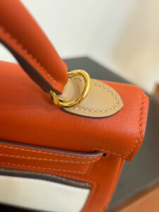 Kelly Colormatic. Authentic quality luxury bag crafted in genuine leather comes with authenticity card, dust bag and gift bag. Hand-crafted from ultra-smooth Swift leather and finished with radiant gold hardware, this exceptional limited-edition masterpiece brings a fresh, artistic twist to the iconic Kelly silhouette. Its cleverly designed front pocket opens wide with a single gusset for effortless access, while the rear flap pocket keeps your daily essentials—especially your most-used cards—right at your fingertips. The asymmetric yet perfectly balanced colour combination highlights the haute craftsmanship Hermès is celebrated for, turning every stitch into a statement. A collector’s dream and a style enthusiast’s delight, the Kelly Colormatic is sophistication with a spark—functional, vibrant, and unmistakably *rmès. - CRIS&COCO Kelly Colormatic. Authentic quality luxury bag crafted in genuine leather comes with authenticity card, dust bag and gift bag. Hand-crafted from ultra-smooth Swift leather and finished with radiant gold hardware, this exceptional limited-edition masterpiece brings a fresh, artistic twist to the iconic Kelly silhouette. Its cleverly designed front pocket opens wide with a single gusset for effortless access, while the rear flap pocket keeps your daily essentials—especially your most-used cards—right at your fingertips. The asymmetric yet perfectly balanced colour combination highlights the haute craftsmanship Hermès is celebrated for, turning every stitch into a statement. A collector’s dream and a style enthusiast’s delight, the Kelly Colormatic is sophistication with a spark—functional, vibrant, and unmistakably *rmès.