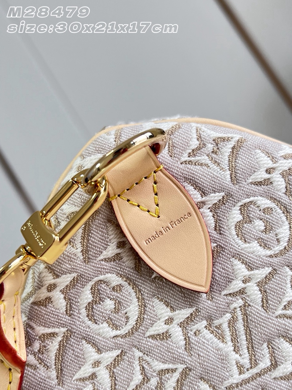 Speedy Soft 30 4 Speedy Soft 30. Authentic quality luxury bag crafted in genuine leather comes with authenticity card, dust bag and gift bag. A Modern Icon, Beautifully Reimagined. The Speedy Soft 30 redefines an iconic silhouette with a fresh expression of the House's legendary craftsmanship. Showcasing the new Monogram Emblème signature, the jacquard canvas is expertly woven to create an elegant, embroidery-inspired finish that blends heritage with innovation. Presented in the sophisticated Peuplier colorway, this edition is accented with a contrasting leather strap, beautifully braided handles, and an exclusive LV address tag for a distinctive finishing touch. Spacious enough to carry your daily essentials—including a tablet—the Speedy Soft 30 offers effortless functionality without compromising on style. Designed for modern lifestyles, this timeless handbag seamlessly combines luxury, versatility, and contemporary elegance, making it the perfect companion from workdays to weekend escapes.