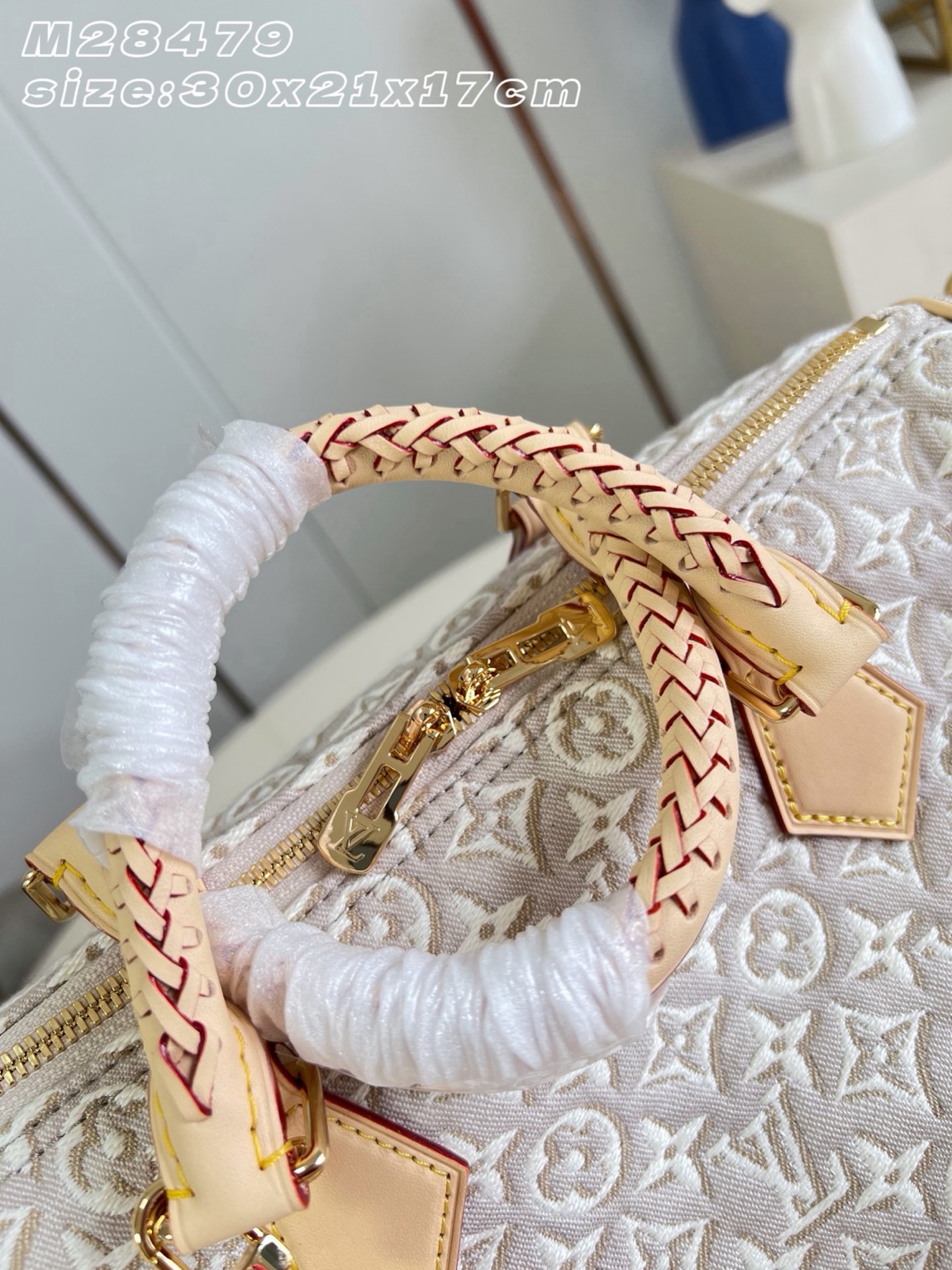 Speedy Soft 30 6 Speedy Soft 30. Authentic quality luxury bag crafted in genuine leather comes with authenticity card, dust bag and gift bag. A Modern Icon, Beautifully Reimagined. The Speedy Soft 30 redefines an iconic silhouette with a fresh expression of the House's legendary craftsmanship. Showcasing the new Monogram Emblème signature, the jacquard canvas is expertly woven to create an elegant, embroidery-inspired finish that blends heritage with innovation. Presented in the sophisticated Peuplier colorway, this edition is accented with a contrasting leather strap, beautifully braided handles, and an exclusive LV address tag for a distinctive finishing touch. Spacious enough to carry your daily essentials—including a tablet—the Speedy Soft 30 offers effortless functionality without compromising on style. Designed for modern lifestyles, this timeless handbag seamlessly combines luxury, versatility, and contemporary elegance, making it the perfect companion from workdays to weekend escapes.