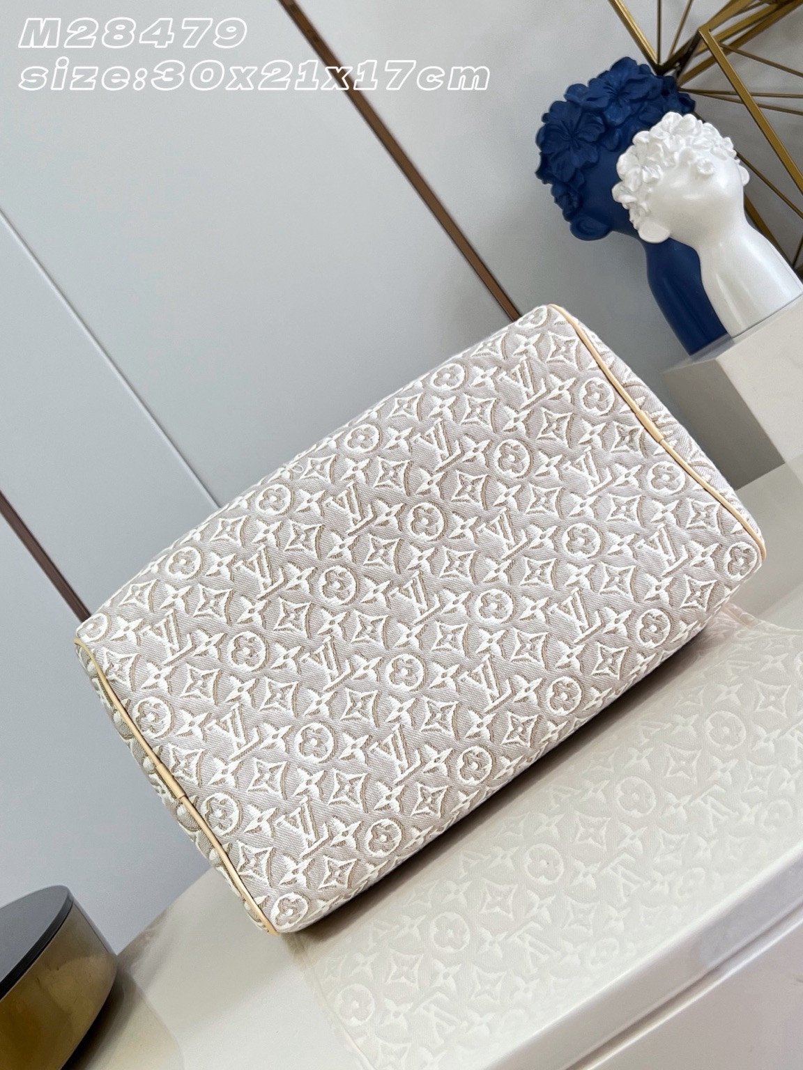Speedy Soft 30 8 Speedy Soft 30. Authentic quality luxury bag crafted in genuine leather comes with authenticity card, dust bag and gift bag. A Modern Icon, Beautifully Reimagined. The Speedy Soft 30 redefines an iconic silhouette with a fresh expression of the House's legendary craftsmanship. Showcasing the new Monogram Emblème signature, the jacquard canvas is expertly woven to create an elegant, embroidery-inspired finish that blends heritage with innovation. Presented in the sophisticated Peuplier colorway, this edition is accented with a contrasting leather strap, beautifully braided handles, and an exclusive LV address tag for a distinctive finishing touch. Spacious enough to carry your daily essentials—including a tablet—the Speedy Soft 30 offers effortless functionality without compromising on style. Designed for modern lifestyles, this timeless handbag seamlessly combines luxury, versatility, and contemporary elegance, making it the perfect companion from workdays to weekend escapes.