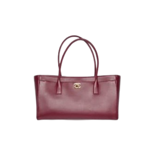 Cerf Tote Small. Authentic quality luxury bag crafted in genuine leather comes with authenticity card, dust bag and gift bag. Timeless Sophistication for Every Day. Elegant, practical, and effortlessly refined, the *ANEL Cerf Tote is designed to accompany you through every moment in style. Crafted from premium caviar leather, this iconic tote combines exceptional durability with *ANEL’s signature timeless appeal. The polished CC turn-lock closure, silver/gold toned hardware, and rolled leather top handles create a look of understated luxury, while the rear exterior pocket and front compartment provide quick access to your daily essentials. Inside, a spacious fabric-lined interior features two zip pockets and a removable zippered pouch, offering thoughtful organization without compromising elegance. Whether you’re heading to the office, enjoying a day in the city, or traveling in style, the *ANEL Cerf Tote delivers the perfect balance of sophistication and functionality. A true wardrobe essential, it is a classic investment piece that remains effortlessly chic season after season.